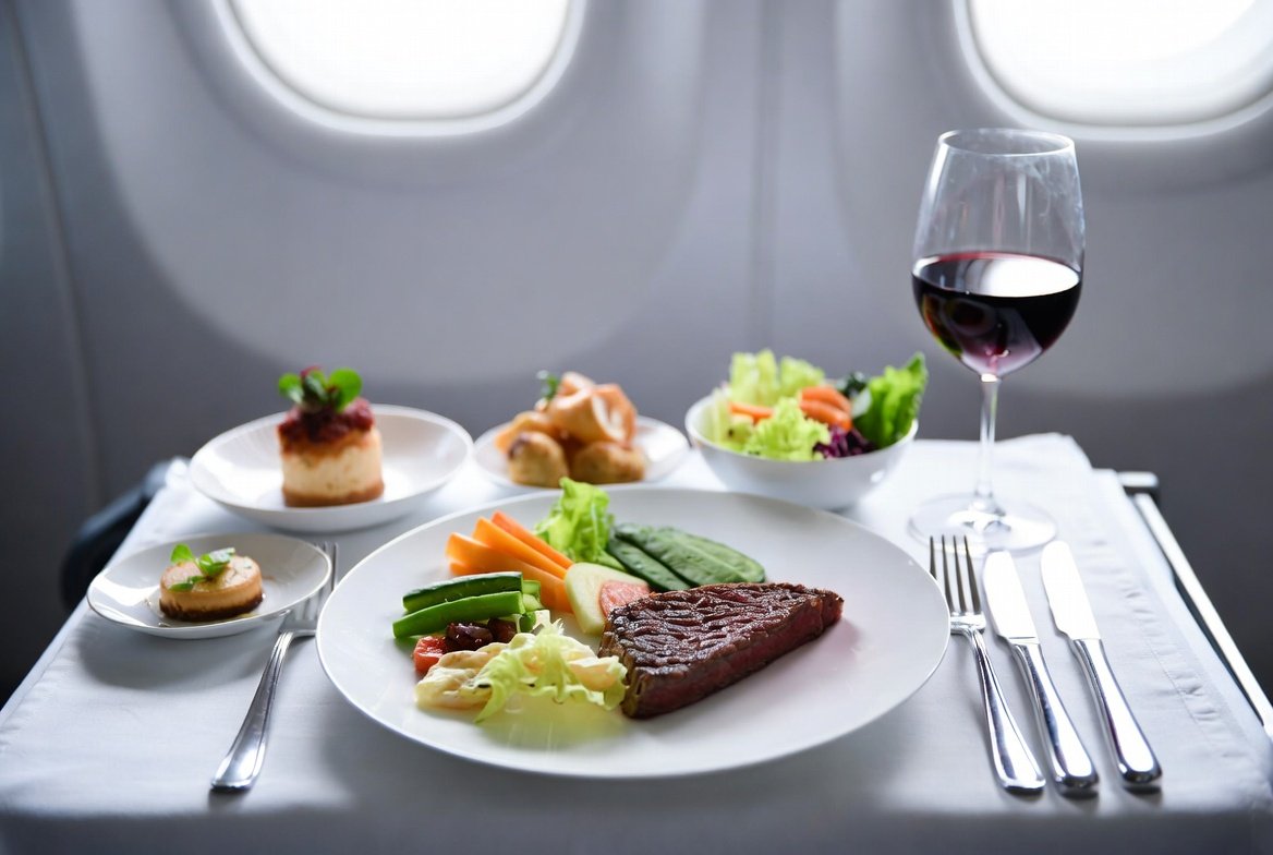 United Airlines Polaris Business Class multi-course meal service